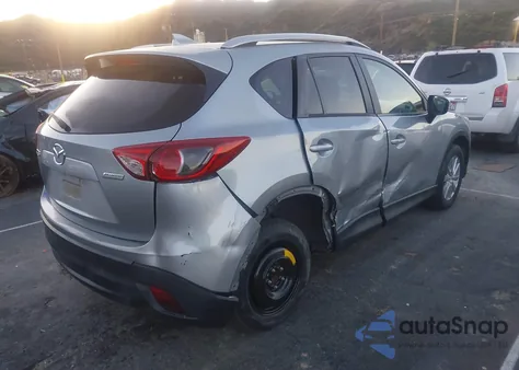 2016 Mazda Cx-5 Touring z USA, uszkodzony, nr VIN JM3KE2CY1G0675929